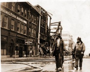 Firefighters survey the aftermath after the five story Waddell Furniture Building at Prairie and Fannin burned to the ground in March of 1938. The fire also caused damage to sixteen buildings nearby.