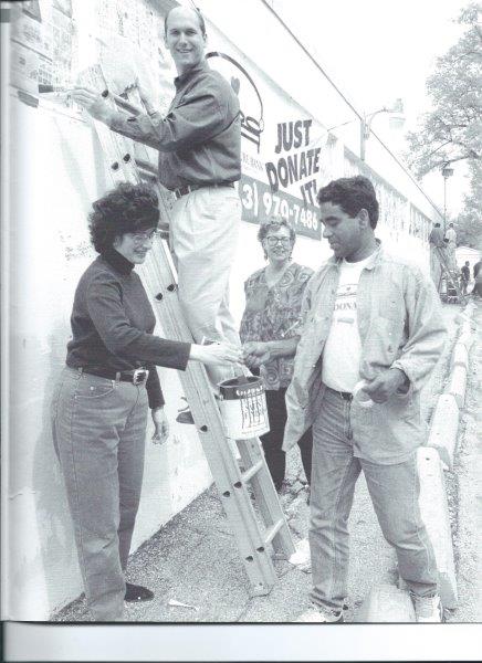 Shown left to right, Pam Goodfriend, member of the board; Steve Finger, chairman of the board at that time; Susie White, member of the board representing the Houston Apartment Association at the time; and Oli Mohammed, founder,  paint the new warehouse in 1998.
